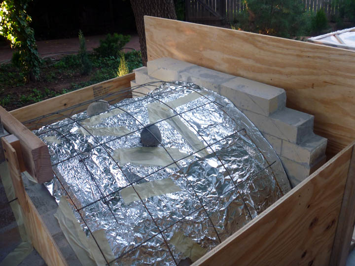 form, mesh and moisture barrier for concrete cladding